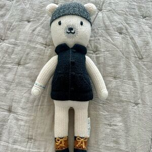 Gray and Black Stuffed Animal with Knit Hat